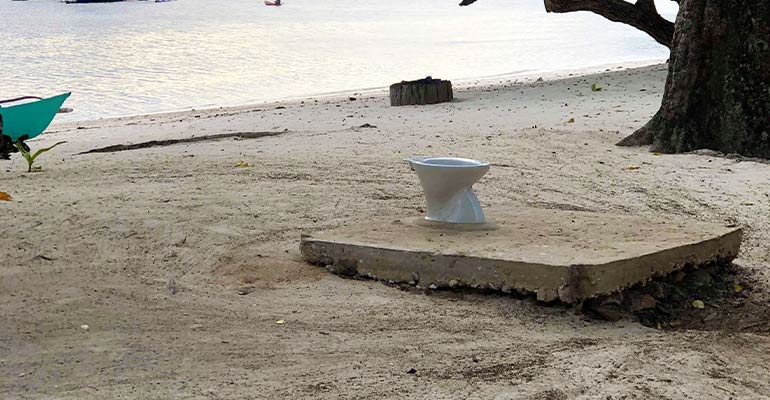 Toilet on a beach