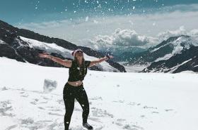 Girl on snowy mountain