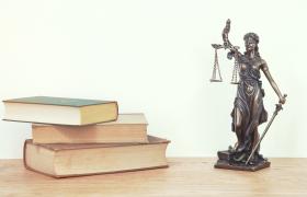 Lady justice and books